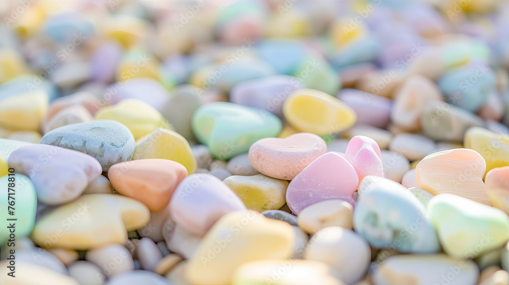 Background of pastel colored pebbles in the shape of hearts
Background of pastel colored pebbles in the shape of hearts