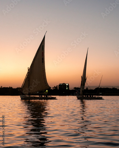 Sunset sailing boat