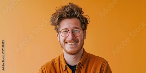 Smiling Scandinavian Man on Orange Background