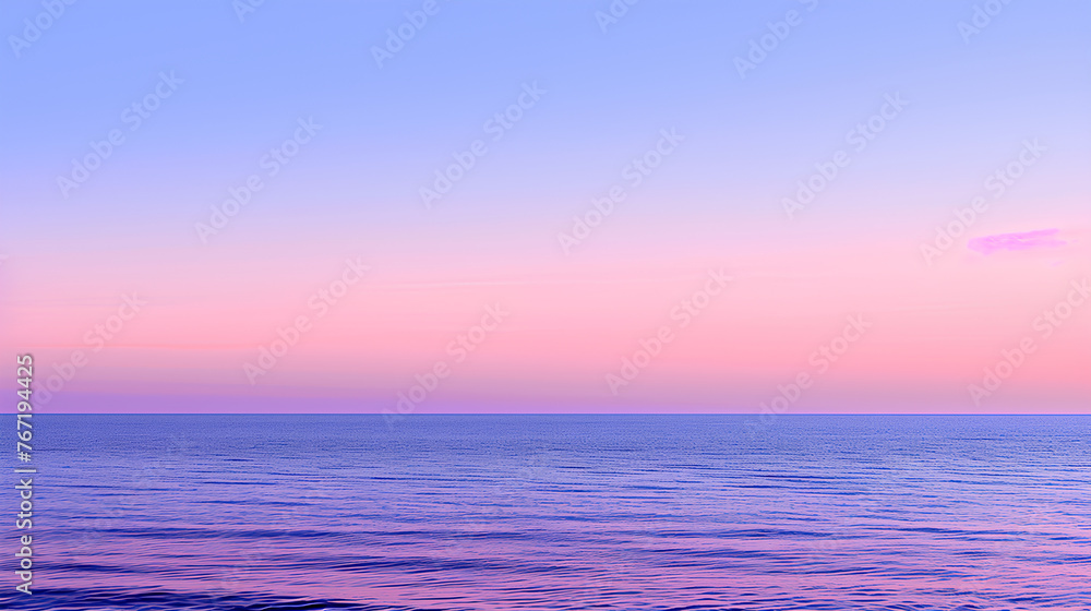 A beautiful blue ocean with a pink sky in the background. The sky is a mix of pink and purple, creating a serene and calming atmosphere. The water is calm and still