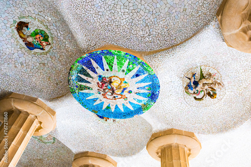 Colorful mosaic on the roof of arcade in Park Guell, Barcelona, Spain.