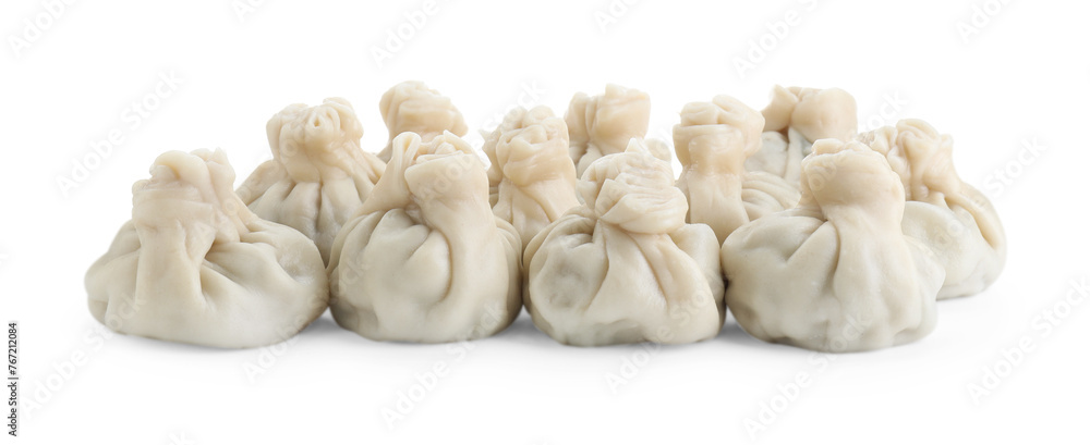 Many tasty khinkali (dumplings) isolated on white. Georgian cuisine Many tasty khinkali (dumplings) isolated on white. Georgian cuisine