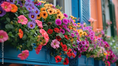 Colorful Flower-Filled Window Boxes © olegganko