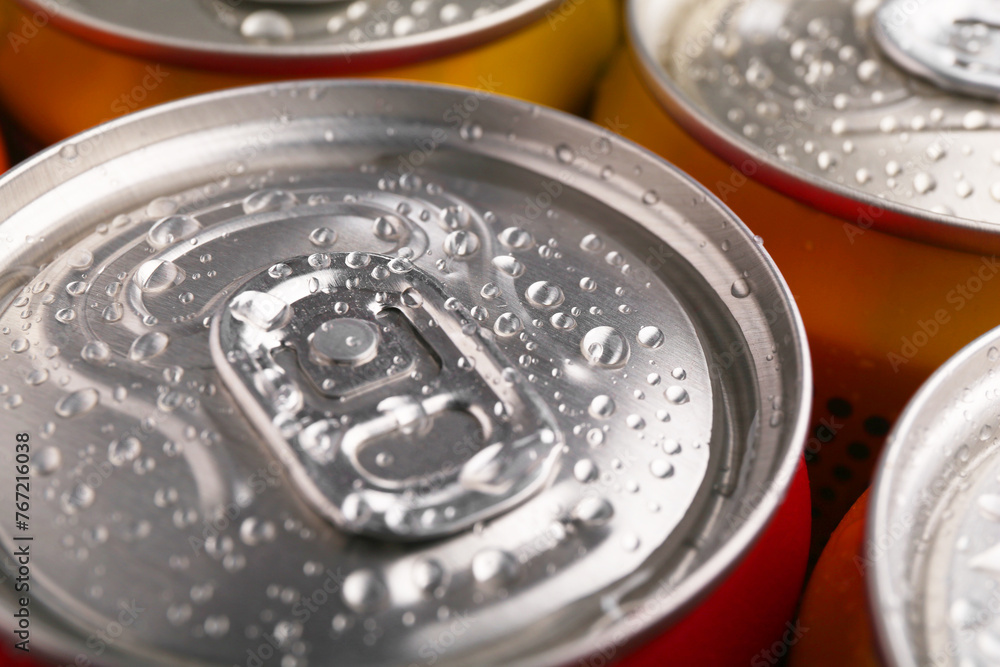 Energy drinks in wet cans, closeup. Functional beverage Energy drinks in wet cans, closeup. Functional beverage