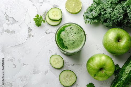 fresh green detox juice with cucumber, apple, and kale on white background