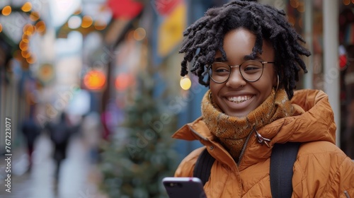 Smiling Woman With Dreadlocks Using Cell Phone