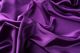 Ripples in purple silk fabric