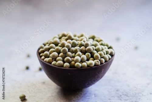 Dry green peas background, selective focus