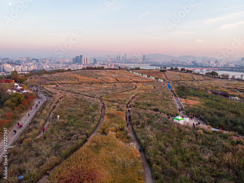 Sunset in Seoul. Aerial Cityscape. South Korea. Skyline of City. Mapo District. Haneul Park in Background. Han River photo