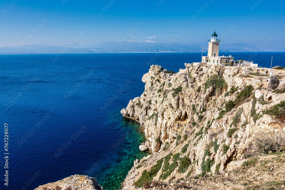 Melagkavi Lighthouse also known as Cape Ireon Light on a headland overlooking the eastern Gulf of Corinth, Greece