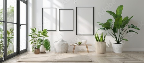 Minimalist frame mockup poster template placed on the floor with plant decor. Frame mockup comes in 50x70, 20x28, and 20RP sizes. Minimalist home decor concept. photo