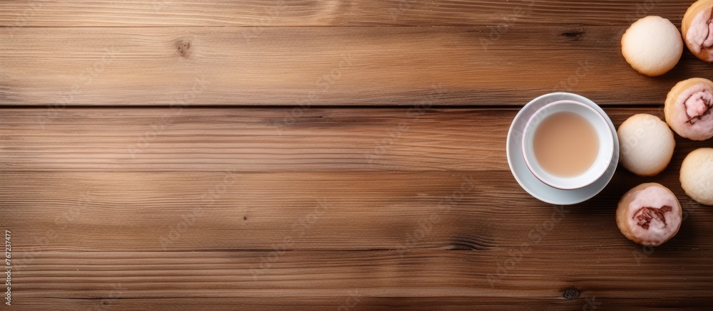 A cup of coffee and onions on a wooden table A cup of coffee and onions on a wooden table