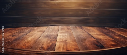 Wooden table with dark backdrop