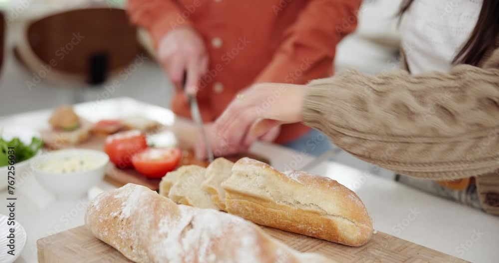 Hands making sandwich with bread in kitchen, snack and healthy for food, salad and cooking. Couple, people and adults in marriage with tomato as ingredient for diet, nutrition and wellness in home Hands making sandwich with bread in kitchen, snack and healthy for food, salad and cooking. Couple, people and adults in marriage with tomato as ingredient for diet, nutrition and wellness in home
