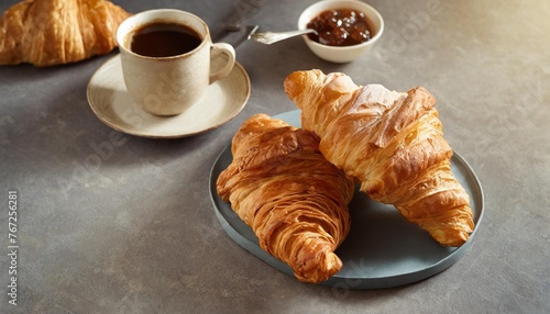 french croissant freshly baked croissants with jam on dark stone background with coffe tasty croissants with copy space