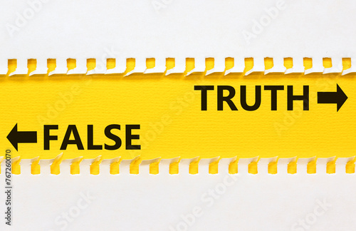 Truth or false symbol. Concept word Truth or False on beautiful yellow paper. Beautiful white paper background. Business and truth or false concept. Copy space.