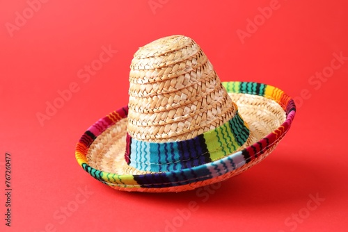 One Mexican sombrero hat on red background