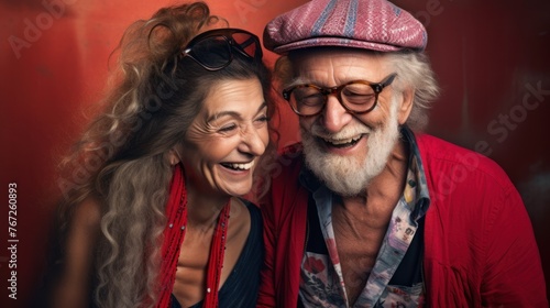 Stylish, grey-haired, bespectacled hipster duo enjoying the simple joys of togetherness. Concept: Positive attitude at any age.