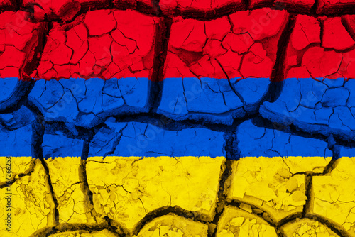 Obraz na płótnie Dry soil pattern on the flag of Armenia. Country with drought concept due to climate change. Water problem. Dry cracked earth country. w salonie