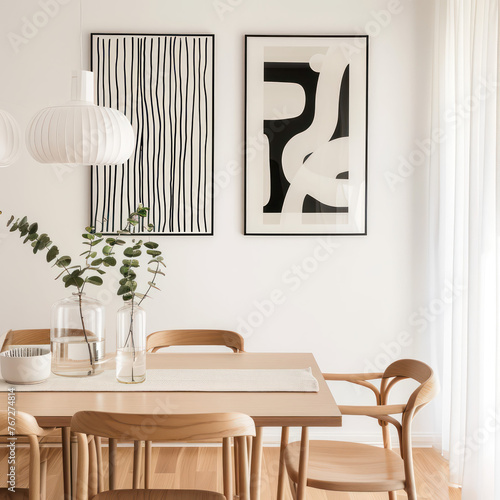 black and white at frame wall  decoration, flower in vase on top of skandinavian dining table set  in white clean color interior design dining room 2 story home decor