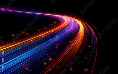 Light trails of neon light glow in speed motion effect on black background. Dynamic light trails of glowing sparks with neon sparkling flares