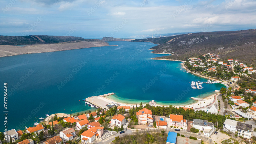 Experience the tranquility and beauty of Jadranovo, a charming coastal village nestled along the picturesque Adriatic coast of Croatia captured from a drone