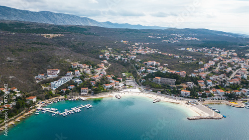 Experience the tranquility and beauty of Jadranovo, a charming coastal village nestled along the picturesque Adriatic coast of Croatia captured from a drone photo