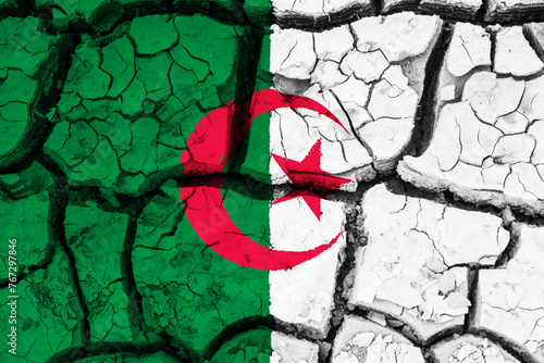 Obraz na płótnie Dry soil pattern on the flag of Algeria. Country with drought concept due to climate change. Water problem. Dry cracked earth country. w salonie