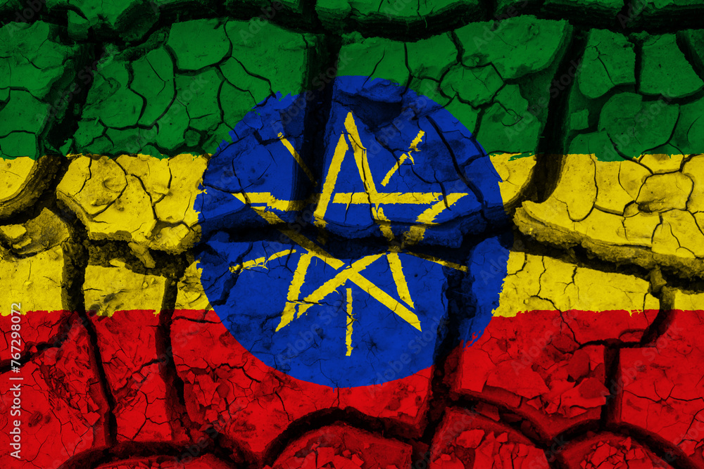 Dry soil pattern on the flag of Ethiopia. Country with drought concept due to climate change. Water problem. Dry cracked earth country.