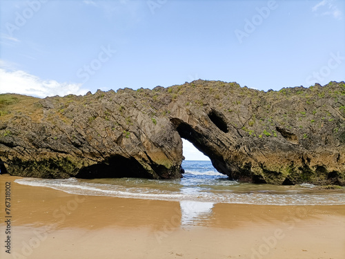 Rock formation in San Antolin beach, Spain photo