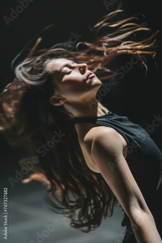 A dancer moving gracefully, their body expressing the music