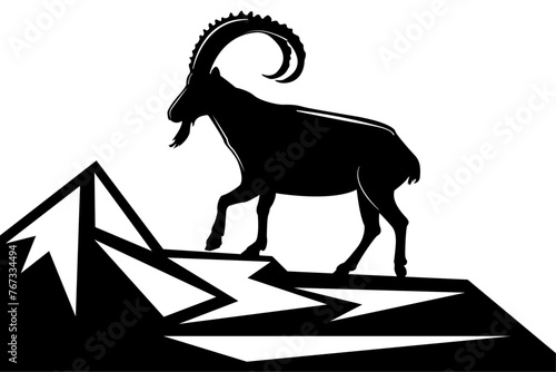 Silhouette of a mountain sheep or ibex in the mountains.