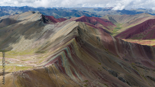 Aerial Drone view of Vinicunca Winikunka Montaña de Siete Colores Rainbow Mountain Andes Mountains Peru photo