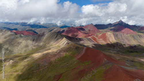 Aerial Drone view of Vinicunca Winikunka Monta  a de Siete Colores Rainbow Mountain Andes Mountains Peru