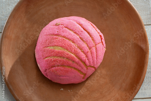 A top down view of a pink Mexican concha.