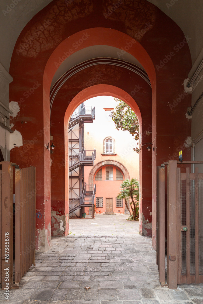 Typical arched street and architectural view in Naples, Italy