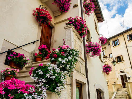 Picturesque houses adorned with colorful blooming flowers, Pescocostanzo, Abruzzo, central Italy