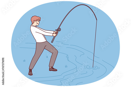 Businessman with fishing rod fishing in river for concept of striving to achieve set goals or attract customers for company. Purposeful man makes efforts to succeed in business or career growth