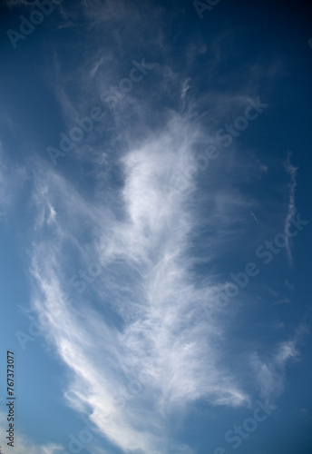 cirrus layered clouds in a blue sky
