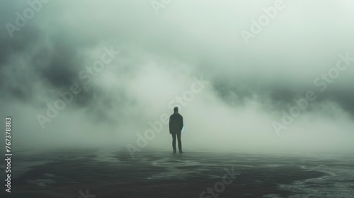 lonely man in darkness photo