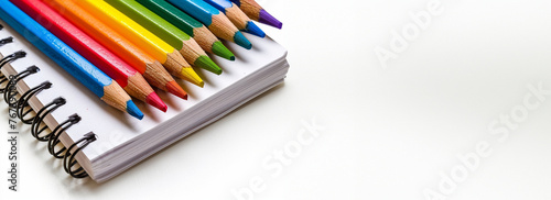 Background for design with colorful pencils and notepad, school, learning, kindergarten, 