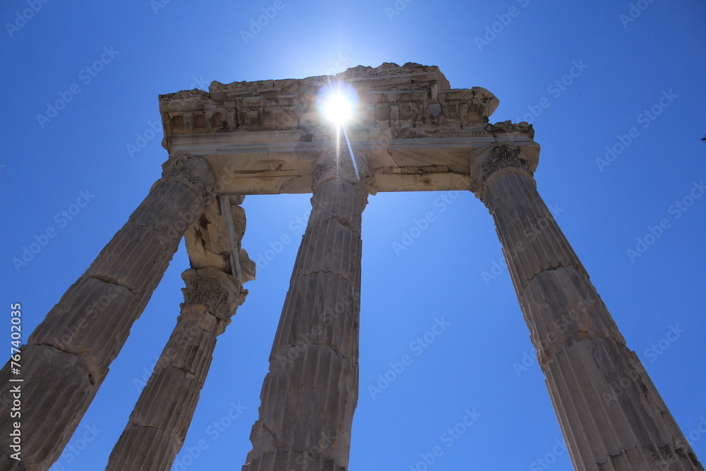 sunlight leaking from ancient columns