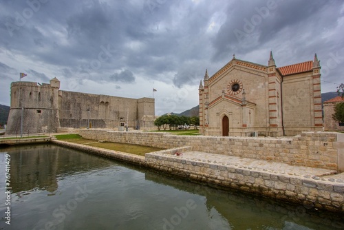 Church and castle in the town center of Ston, near Dubrovnik, Croatia © matuty