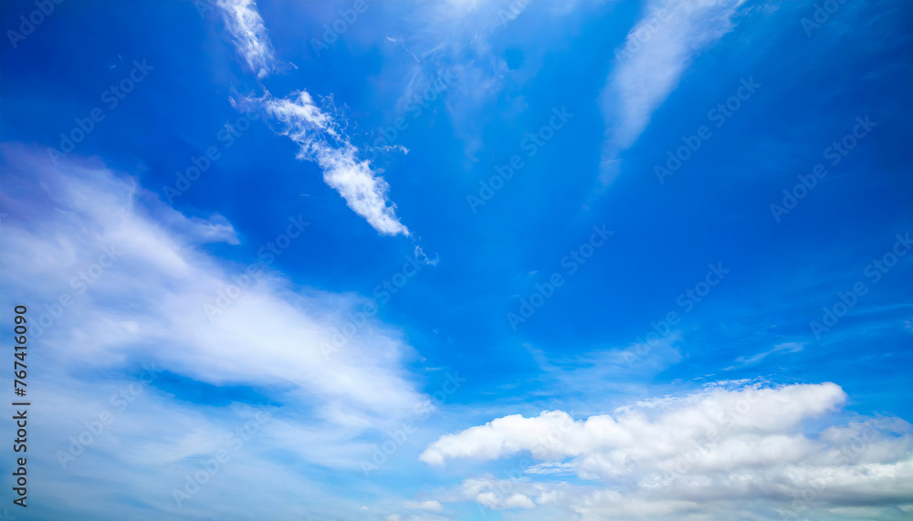 Clear blue sky with some white clouds Clear blue sky with some white clouds