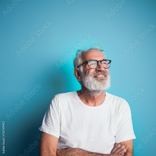 Prime Adult Male Embracing with Copy Space - Isolated on Blue Background