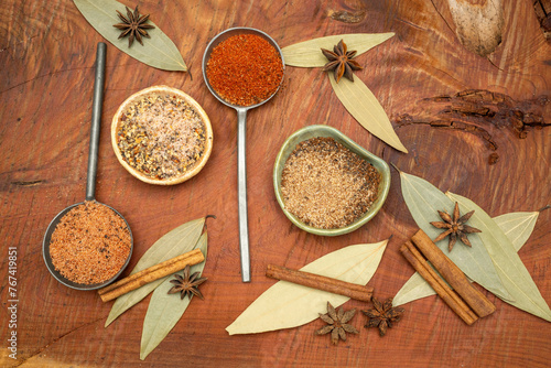 spices and herbs on wood