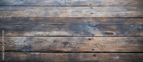 A detailed shot showcasing a hardwood flooring with a blurred background, highlighting the intricate patterns and texture of the wood