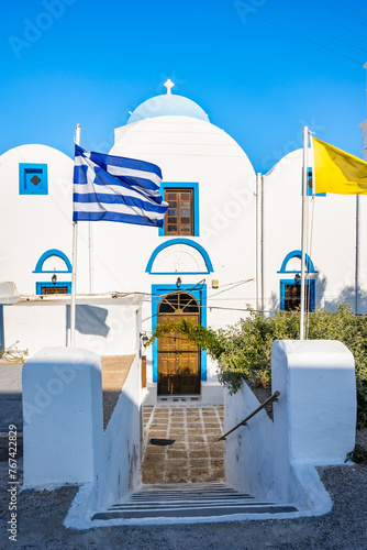 Entrance steps to beautiful Greek church in Adamas village port, Milos island, Cyclades, Greece
