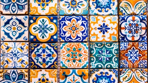  a close up of a tiled wall with many different colors and shapes of tiles in the same pattern as well as the colors of the tiles.