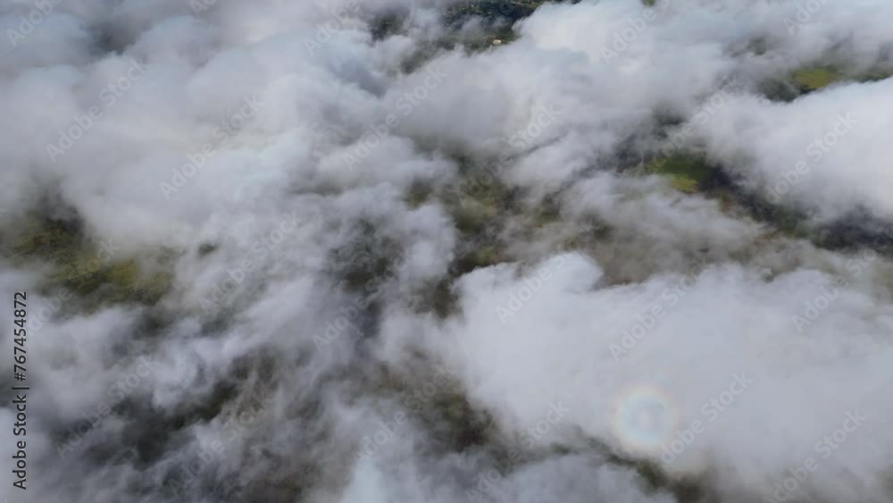 Aerial shot of above the clouds in Maui landscape. Aerial shot of above the clouds in Maui landscape.